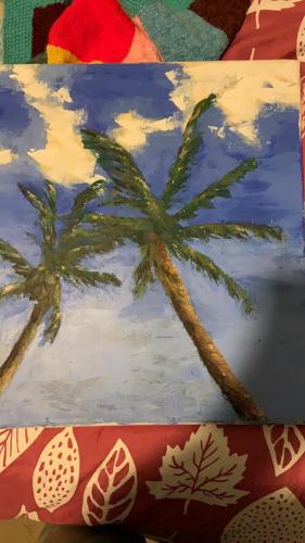 Palms outside window